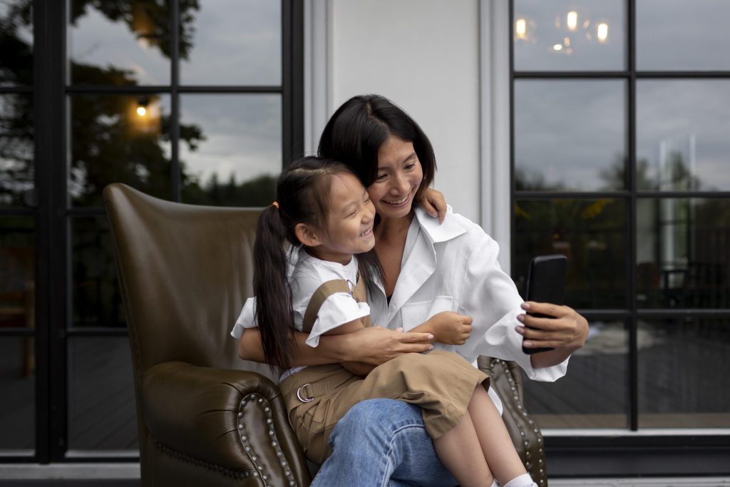Woman Having Video Call With Her Husband Their Daughter Outdoors Scaled 1 1024x683
